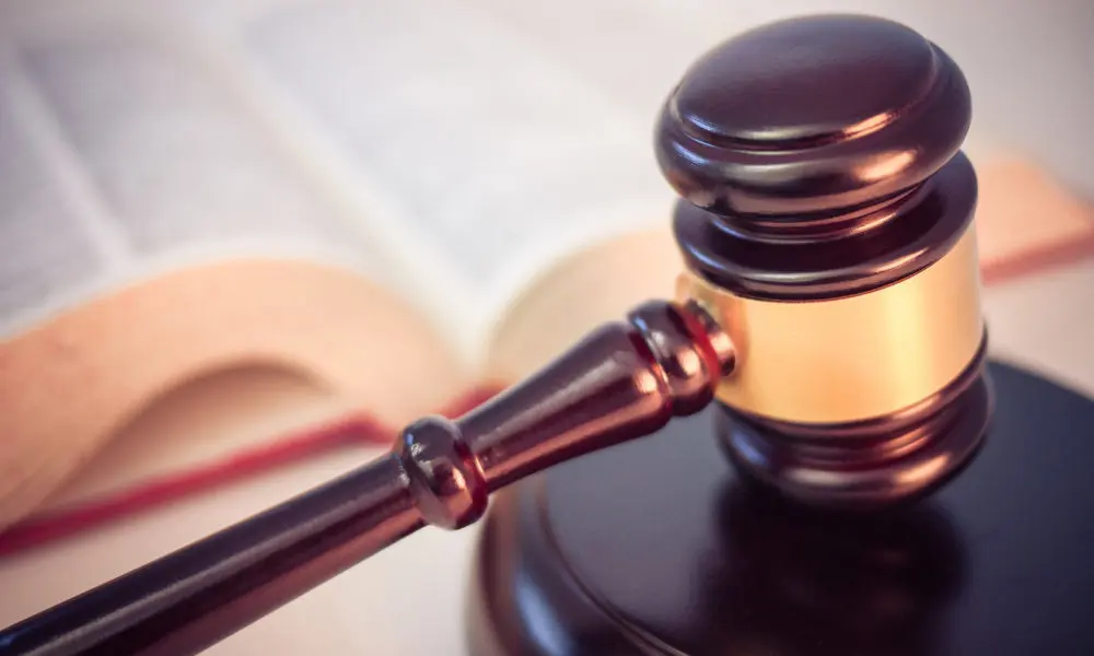 High Court rules coroner Hassell’s protocol ‘unlawful’ and ‘discriminatory’