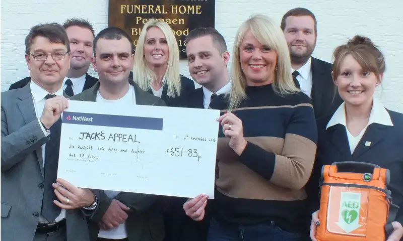 Charity car wash raises £650 for community defibrillator