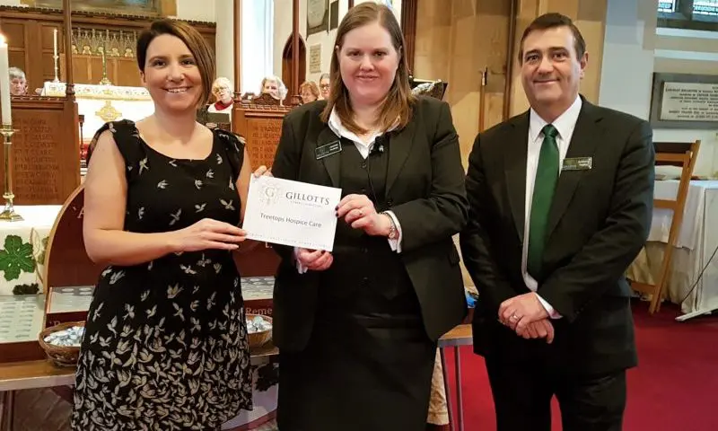 Funeral firm hands over £2,000 charity cheque