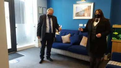 Dignity awards employee with special commemorative award