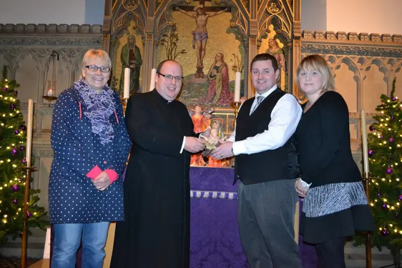 Funeral directors donate crib set to local church