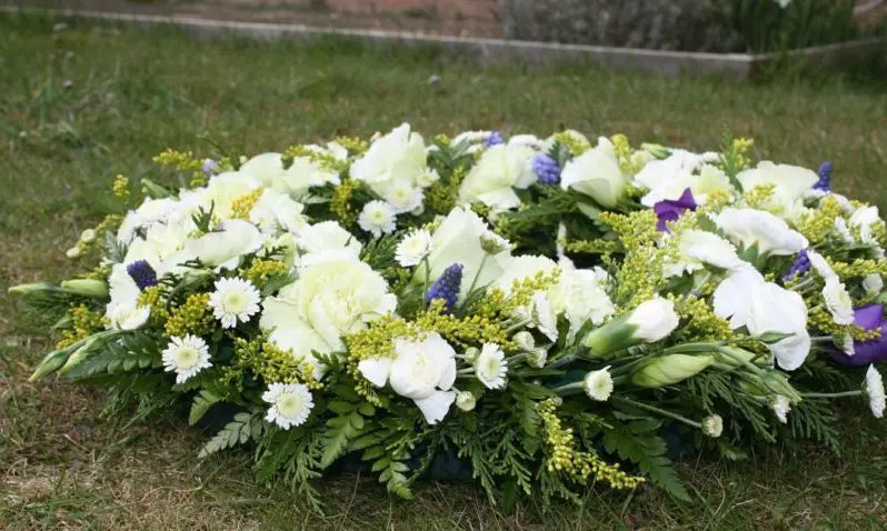 Wreath trashed mid-funeral by students