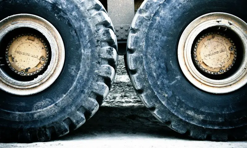 Hearse smashed into by bin lorry wheel
