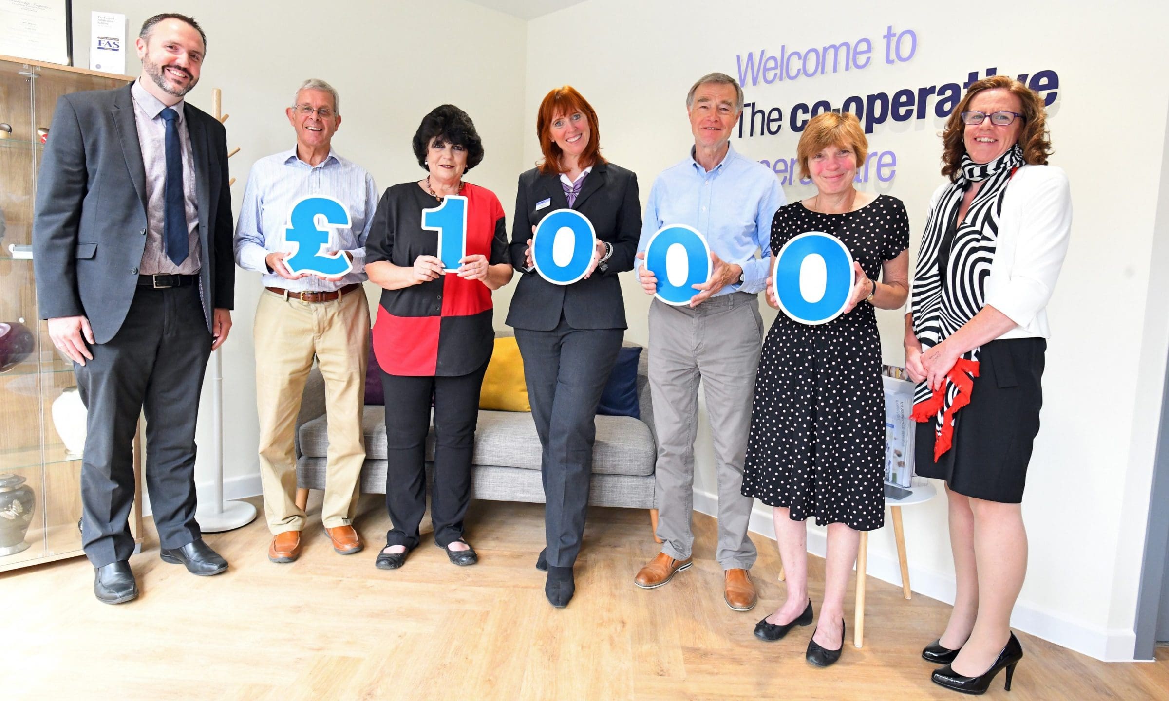 Funeral home opening raises £1000 for local charity