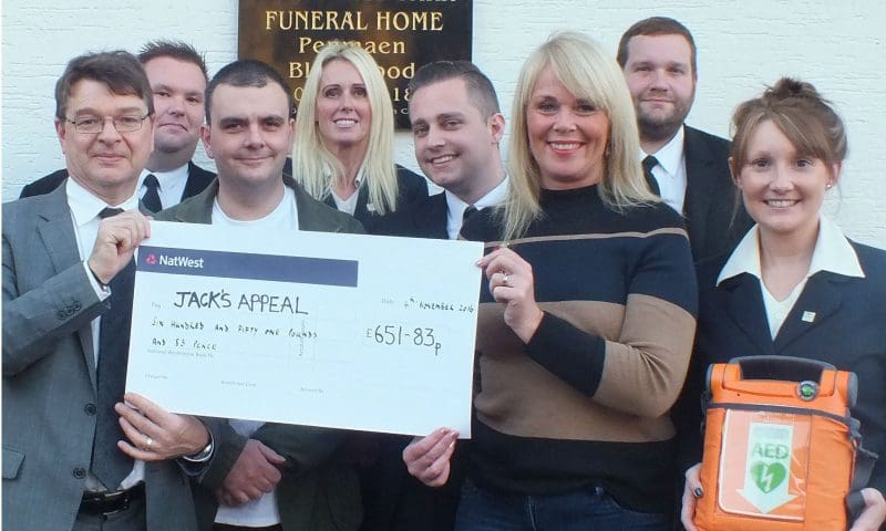 Charity car wash raises £650 for community defibrillator