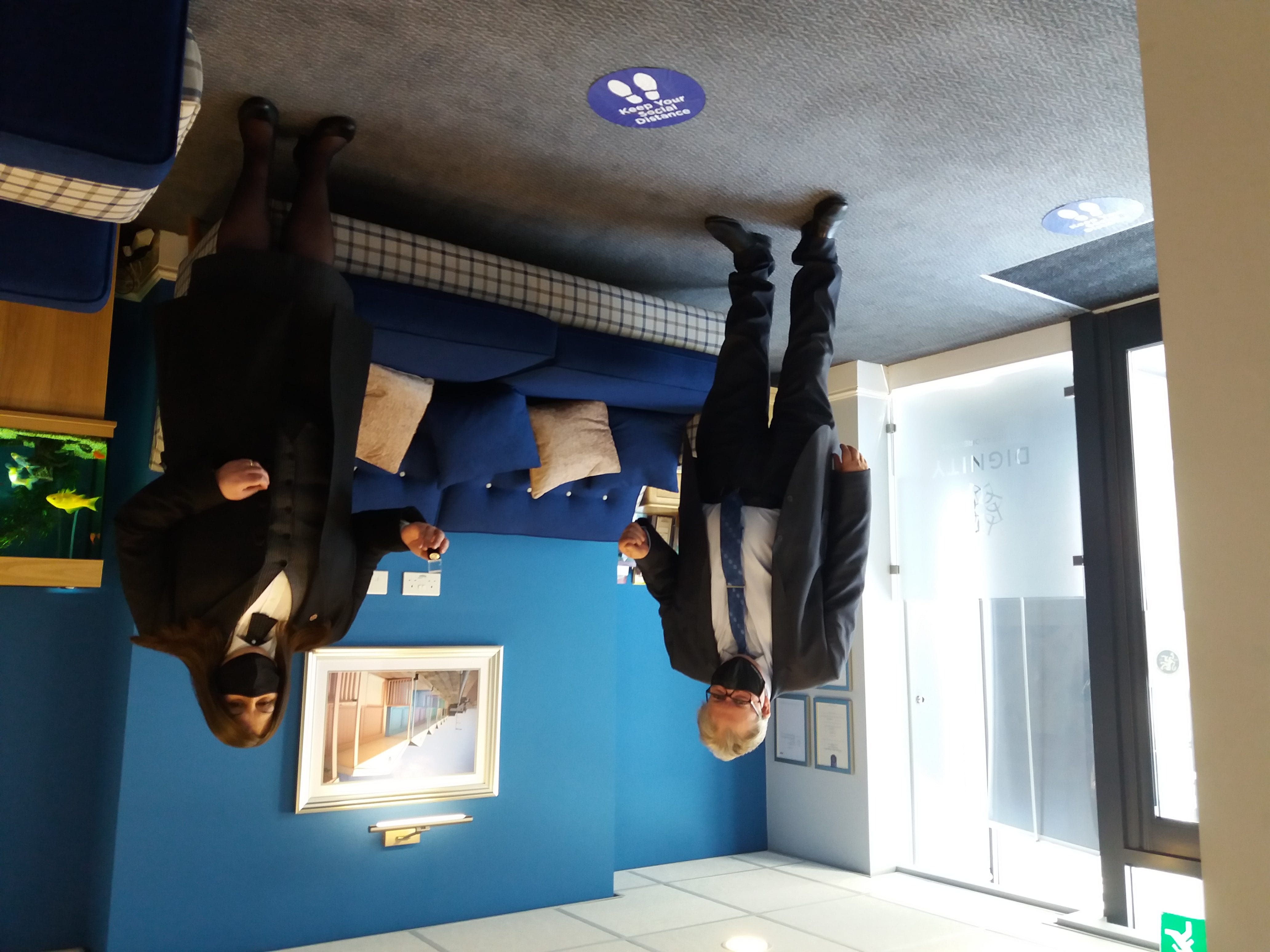 Dignity awards employee with special commemorative award