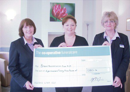 Funeral home fundraising supports breast cancer unit